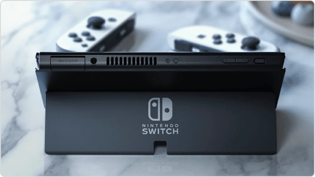 Nintendo Switch OLED (Japanese Edition) – White Joy-Con, 7" OLED Screen, 3 Play Modes,