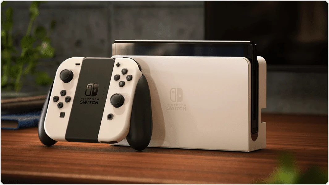 Nintendo Switch OLED (Japanese Edition) – White Joy-Con, 7" OLED Screen, 3 Play Modes,